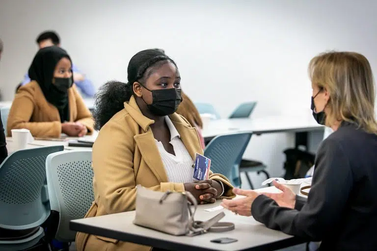 Student in mask participating in speed mentoring